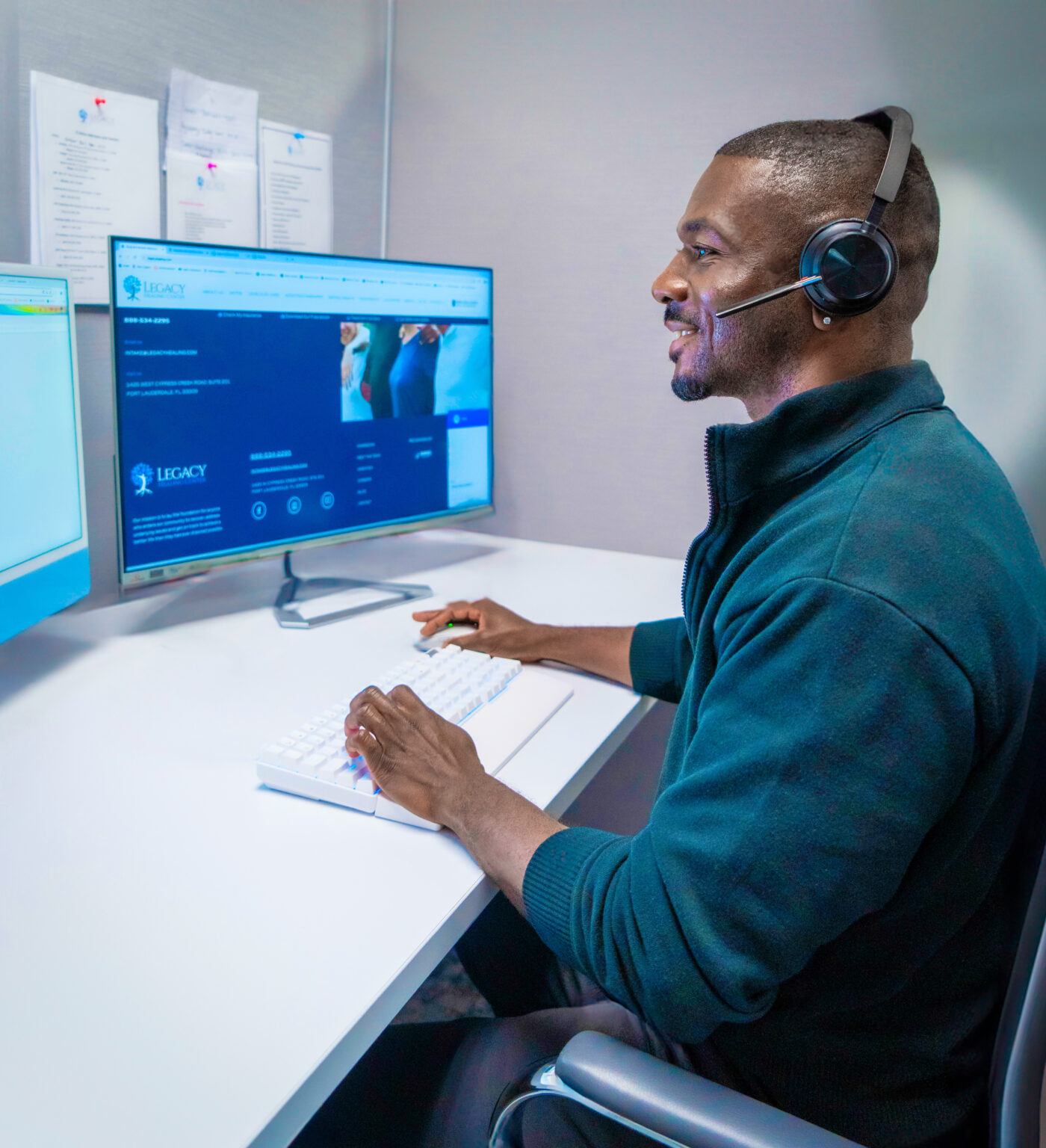 An employee at Legacy Healing Center answering phones.