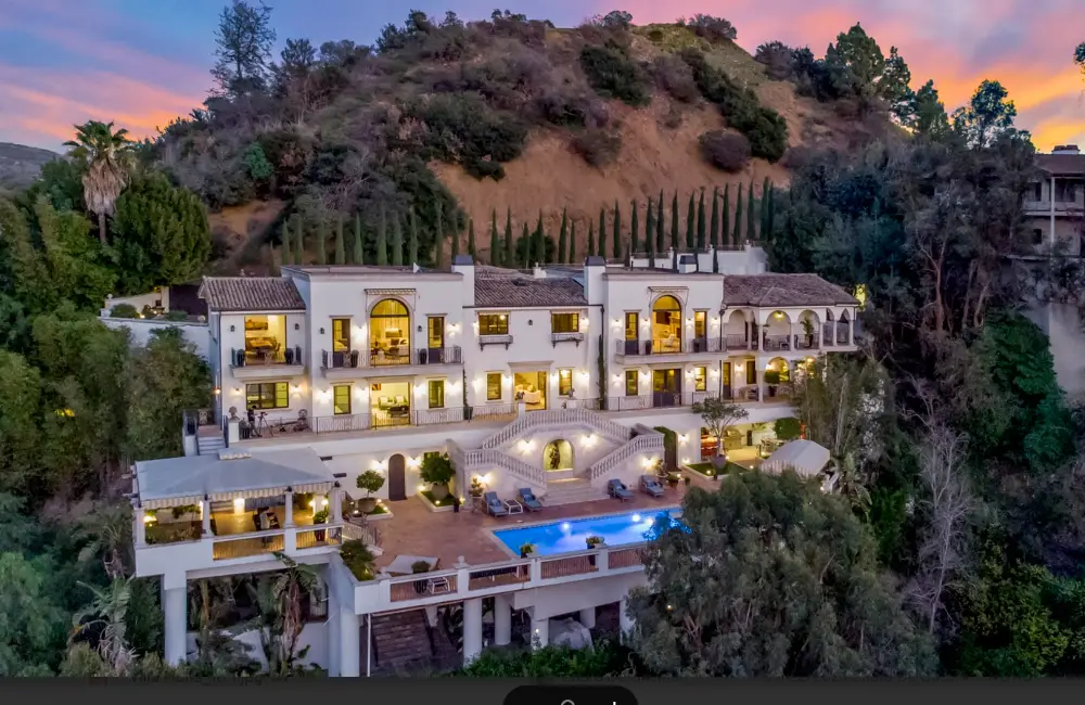 Aerial view of a luxury high end rehab in California, which is home to one of five Legacy Healing Center private luxury rehabs in Los Angeles, featuring Mediterranean architecture and a serene pool terrace.